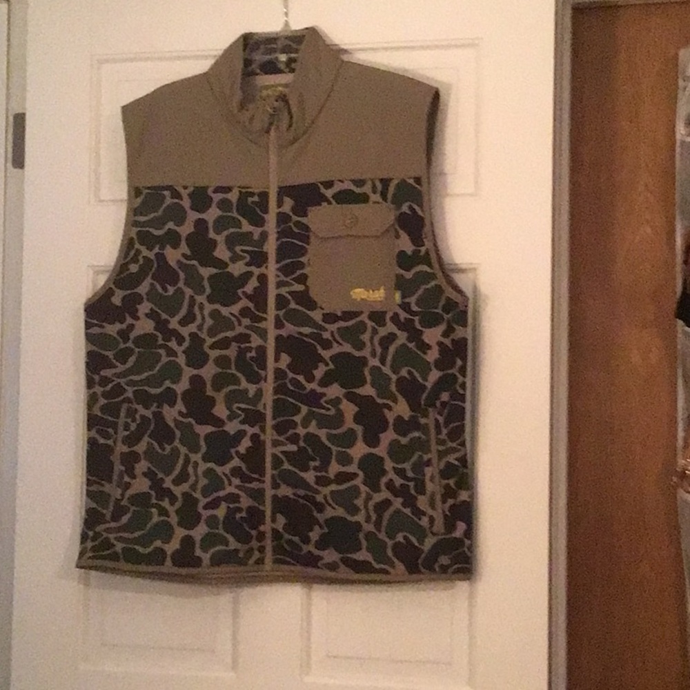 Greens & Browns on this sleeveless shirt.